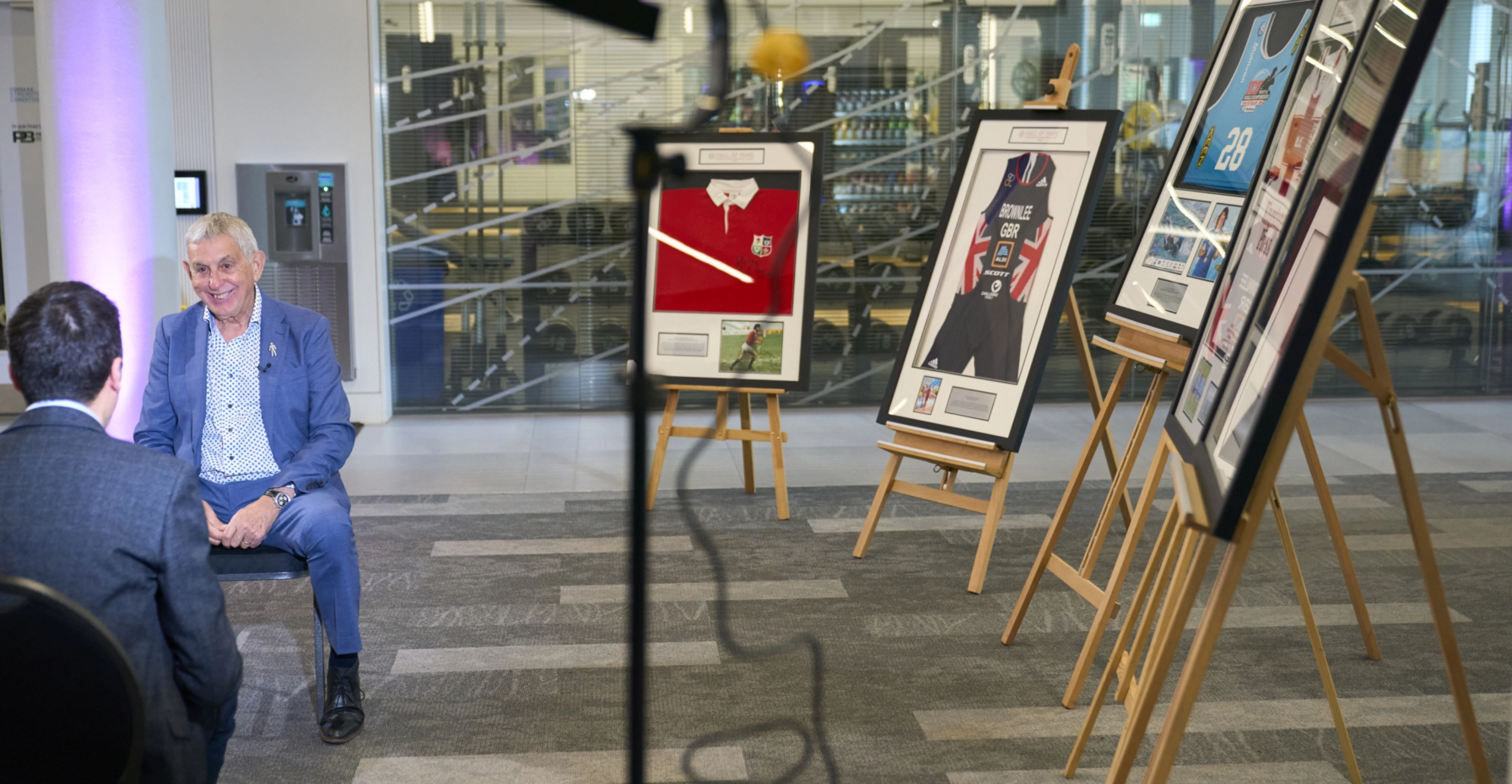 Sir Ian McGeechan being interviewed by a Sky Sports journalist at Leeds Beckett University Hall of Fame
